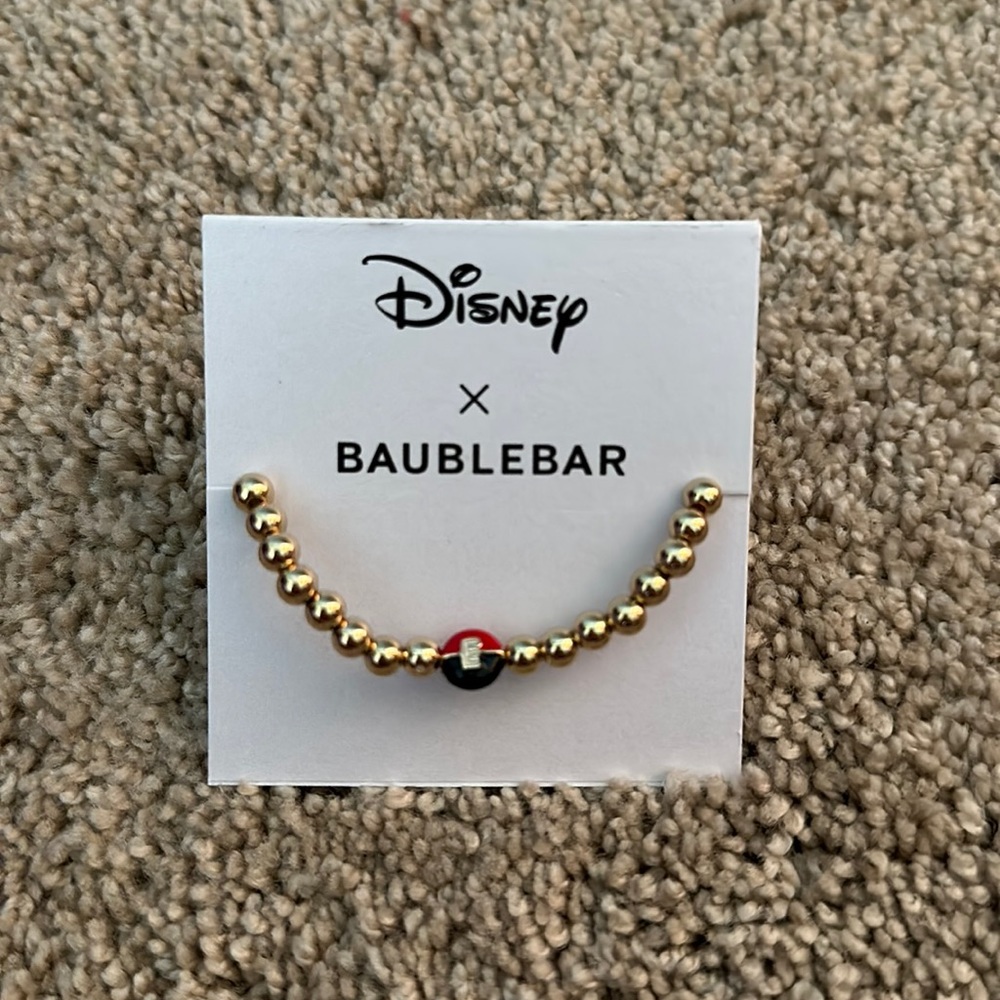 BaubleBar Bracelet with an E and Mickey Mouse Head